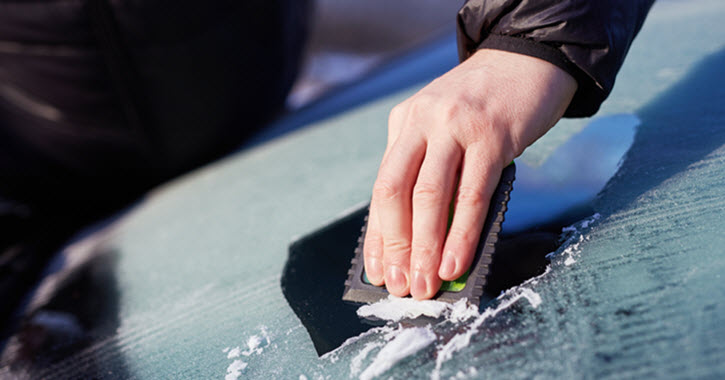 Ice Scrapping from Windshield
